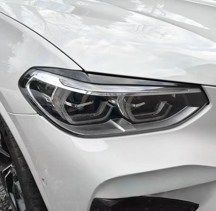 Strålkastarlister / ögonbryn sats för BMW G01 X3 / G02 X4 PRE-LCI (18-21), blank svart